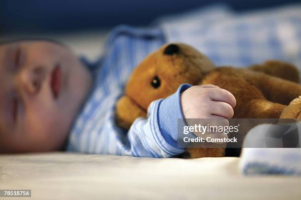 baby boy sleeping with teddy bear - stuffed toy stock pictures, royalty-free photos & images
