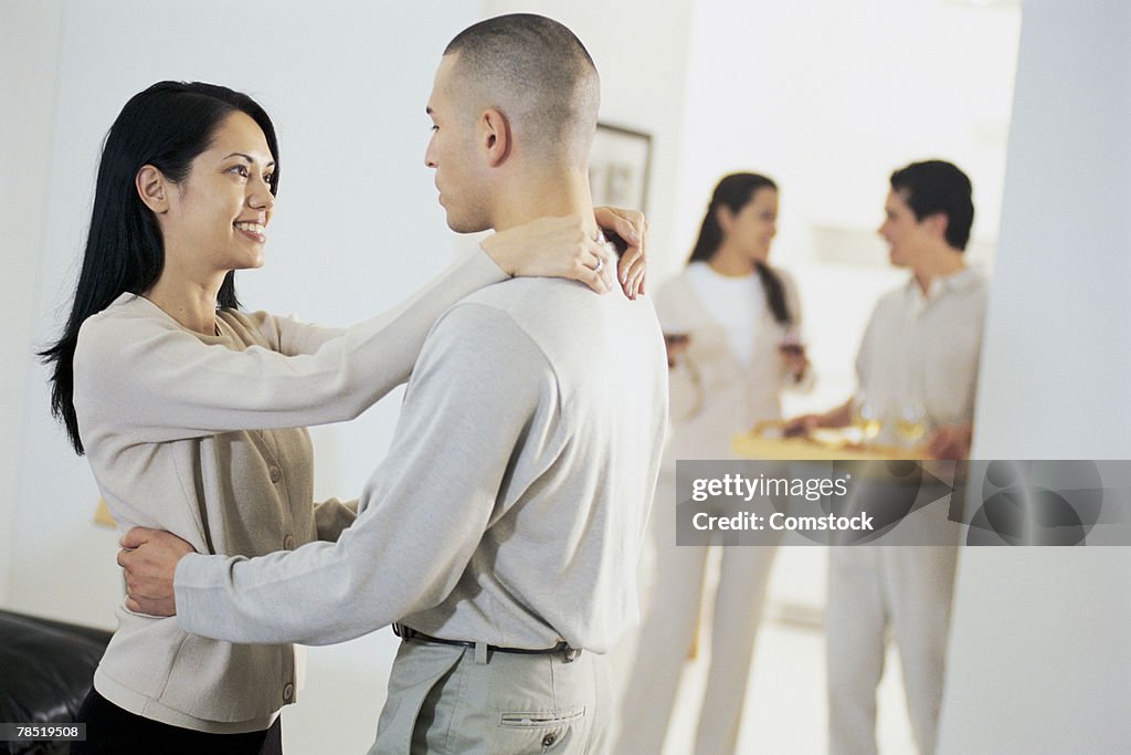 Couple dancing indoors