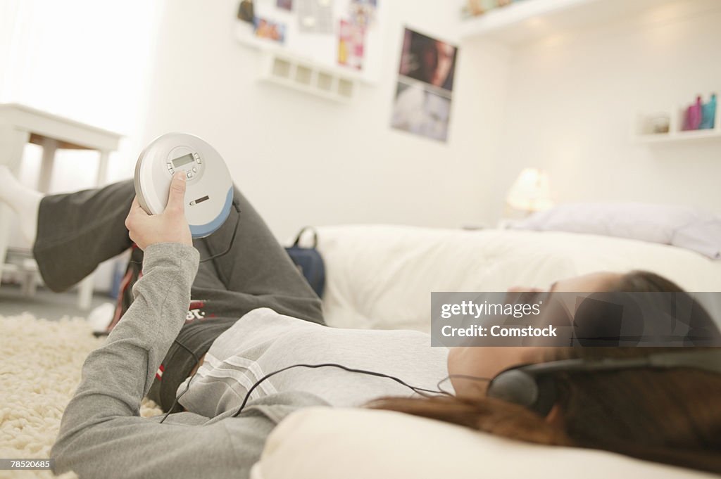 Teenager listening to music