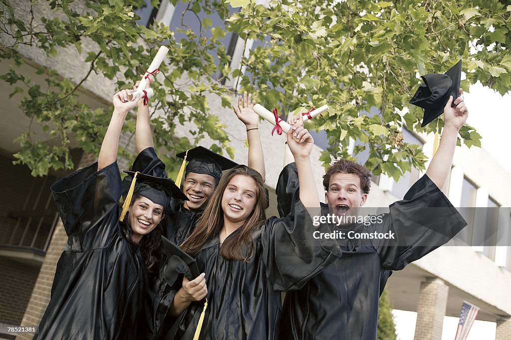 High school graduates celebrating