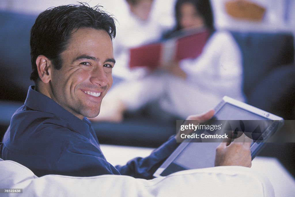 Man using tablet computer