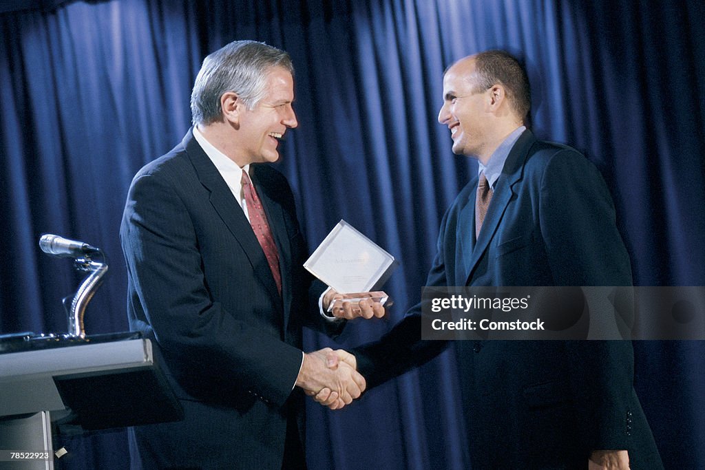 Man receiving award