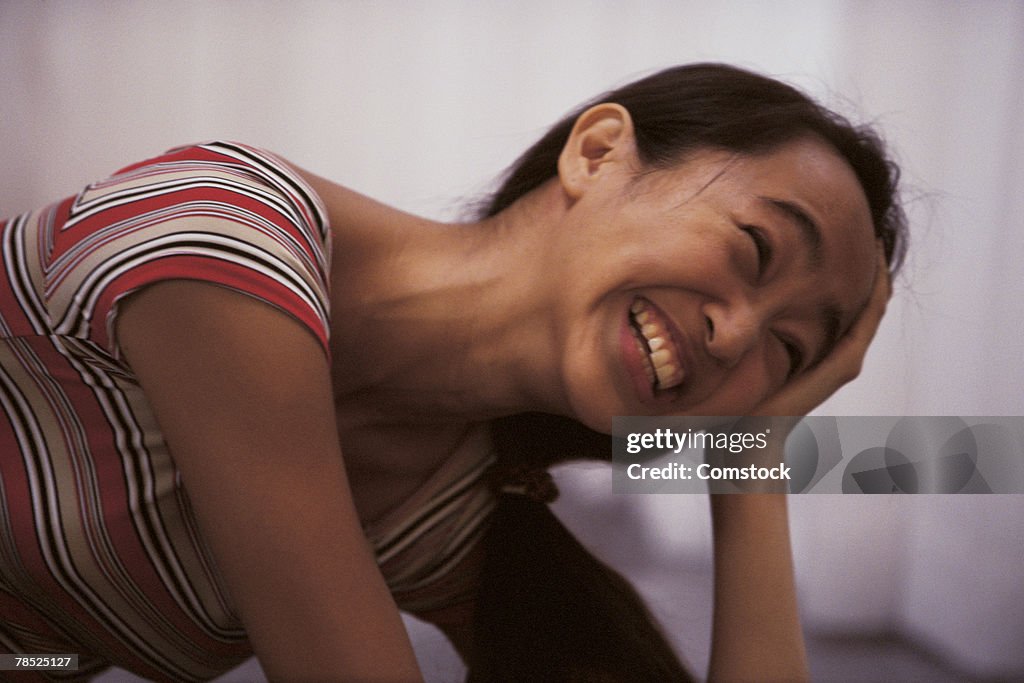 Teenage girl laughing