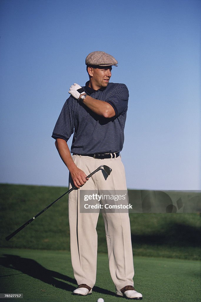 Man playing golf