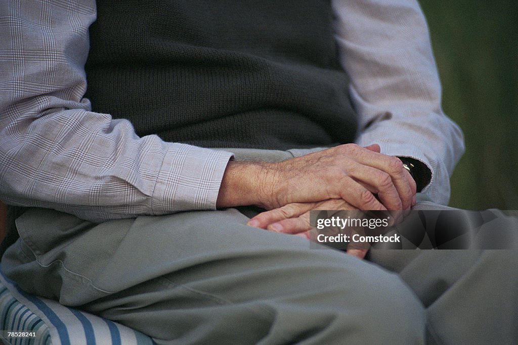 Close-up of senior man sitting