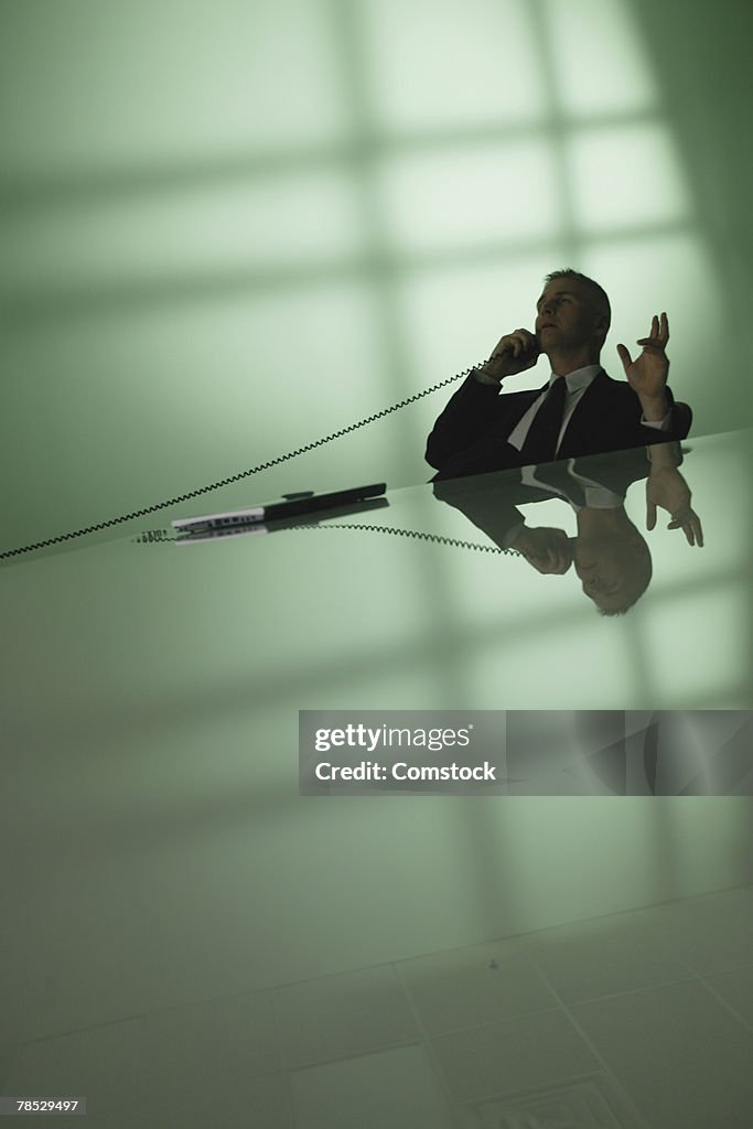 Businessman talking on telephone