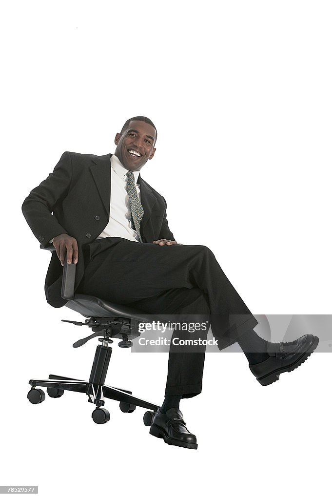 Businessman sitting in chair