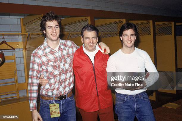 Head coach George Allen of the Washington Redskins poses with his sons George Jr. And Bruce after a game against the Los Angeles Rams at RFK Stadium...