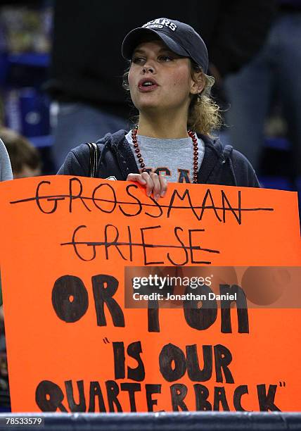 Fan of the Chicago Bears holds a sign with the Bears' new starting quarterback, Kyle Orton, who will play against the Minnesota Vikings at the Hubert...