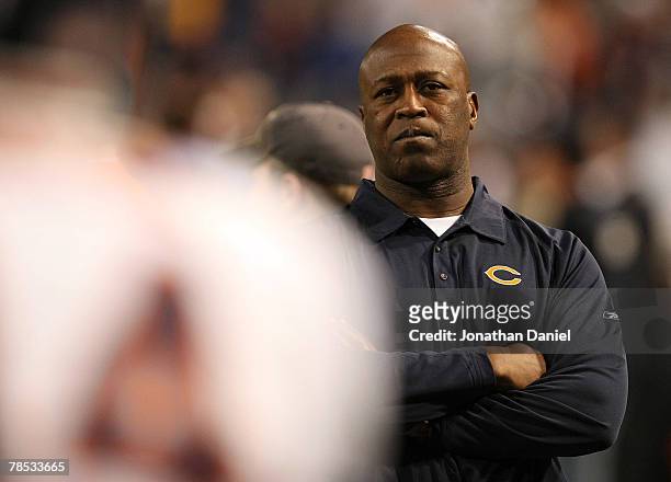Head coach Lovie Smith of the Chicago Bears watches as his team warms-up before a game against the Minnesota Vikings at the Hubert H. Humphrey...