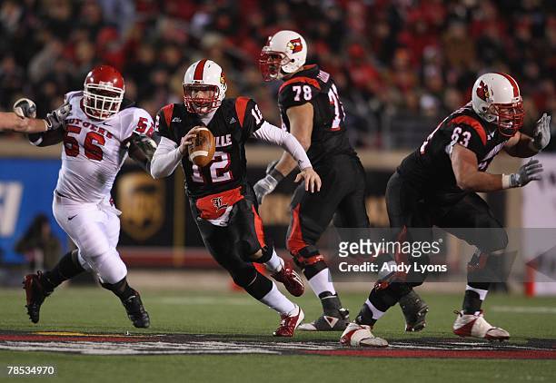 Brian Brohm of the Louisville Cardinals scrambles out of the pocket during the Big East Conference game against the Rutgers Scarlet Knights on...