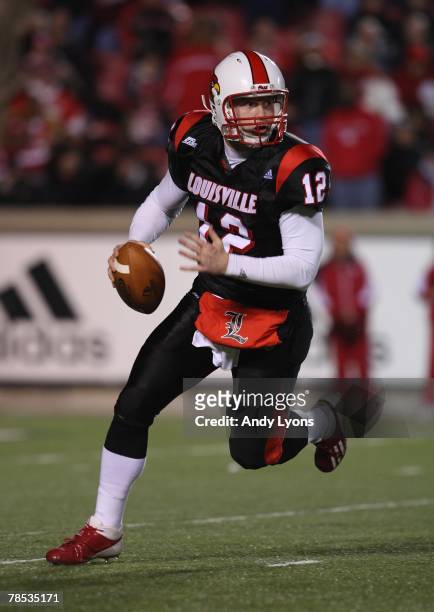 Brian Brohm of the Louisville Cardinals rolls out to pass during the Big East Conference game against the Rutgers Scarlet Knights on November 29,...