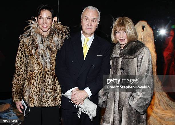 Socialite Amy Fine Collins, designer Manolo Blahnik, and Vogue Editor Anna Wintour attend the "Blog.mode Addressing Fashion" reception at The...