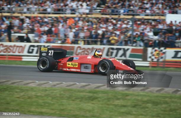 Italian racing driver Michele Alboreto , drives the Scuderia Ferrari SpA SEFAC Ferrari 156/85 Ferrari 031 1.5 V6t to finish in 2nd place in the 1985...