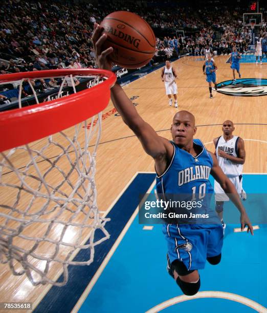 Keith Bogans of the Orlando Magic lays it up against the Dallas Mavericks at the American Airlines Center December 17, 2007 in Dallas, Texas. NOTE TO...