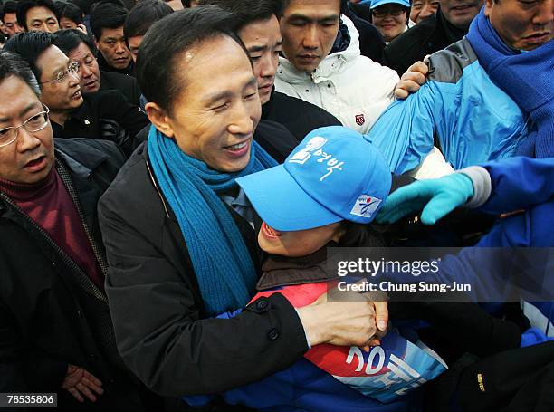 Presidential candidate Lee Myung-Bak of the conservative main opposition Grand National Party , meets with his supporters during a presidential...