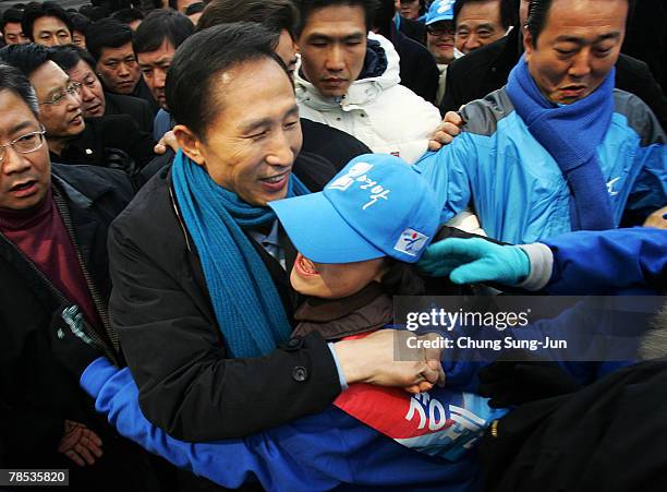 Presidential candidate Lee Myung-Bak of the conservative main opposition Grand National Party , meets with his supporters during a presidential...