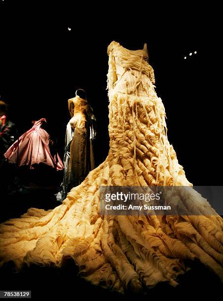 An Alexander McQueen "Oyster" dress is displayed at the "Blog.mode: addressing fashion" exhibit at the Metropolitan Museum of Art's Costume Institute...