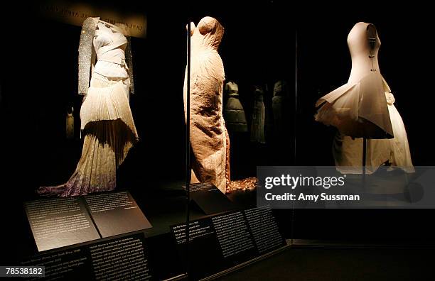 Dresses are displayed at the "Blog.mode: addressing fashion" exhibit at the Metropolitan Museum of Art's Costume Institute on December 17, 2007 in...