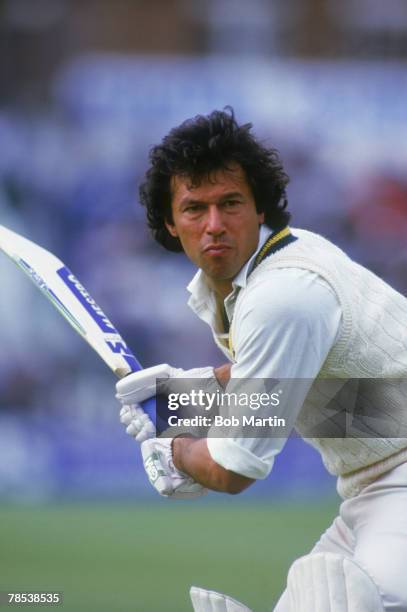 Pakistani cricketer and politician Imran Khan at the crease during a One Day International against England, circa 1985.