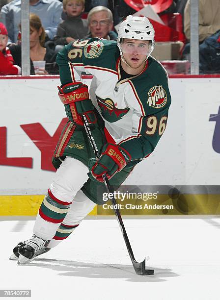 Pierre-Marc Bouchard of the Minnesota Wild skates in a game against the Detroit Red Wings on December 7, 2007 at the Joe Louis Arena in Detroit,...