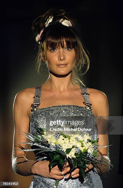 Model Carla Bruni walks the catwalk at the Versace High Fashion show in Paris, France. According to reports, December 18, 2007 French President...