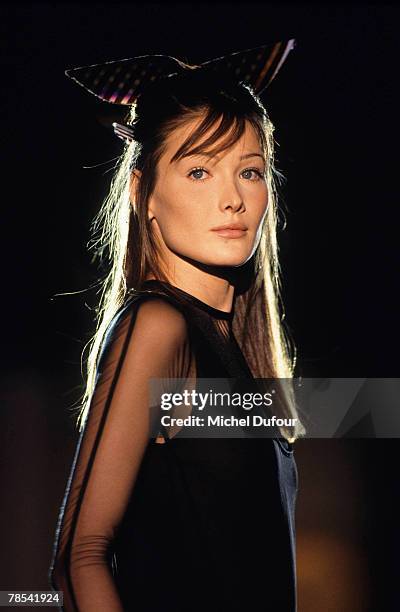 Model Carla Bruni walks the catwalk at the Versace High Fashion show in Paris, France. According to reports, December 18, 2007 French President...