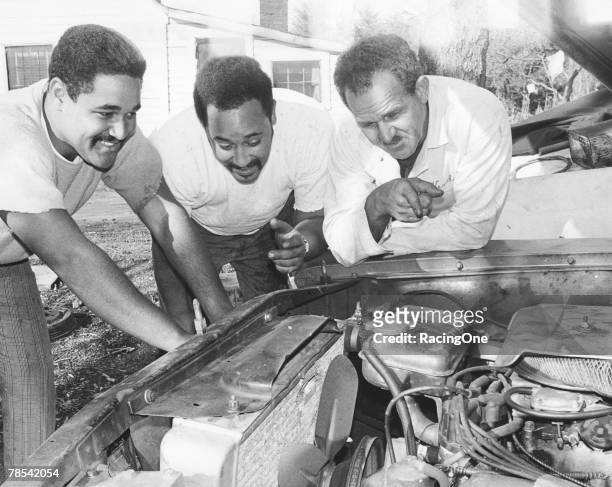 Wendell Scott with sons Wendell Jr. And Frankie work on engine in Danville, Virginia.