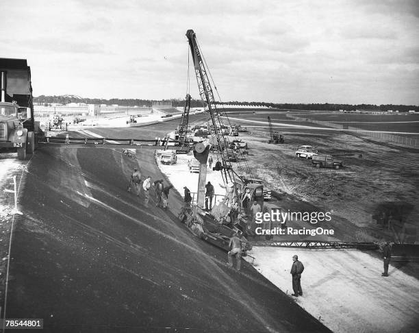 Construction of the Daytona International Speedway in Daytona Beach, Florida in 1958 during the asphalt stages. The foresight of Bill France Sr. Is...