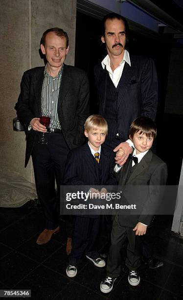 Musician Nick Cave with sons Arthur and Earl and journalist Andrew Marr attend the gala screening of the 'Doctor Who' Christmas episode at the...