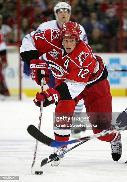Eric Staal of the Carolina Hurricanes skates down the ice during the game against the Toronto Maple Leafs at the RBC Center on December 18, 2007 in...