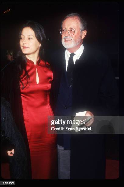 Actress Meg Tilly and an unidentified man attend the premiere of the film "Jerry Maguire" at Pier 88 December 6, 1996 in New York City. The film...