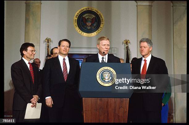 Congressman Dick Gephardt speaks while President Bill Clinton, Vice President Al Gore and Senate minority leader Tom Daschle watch February 14, 1998...