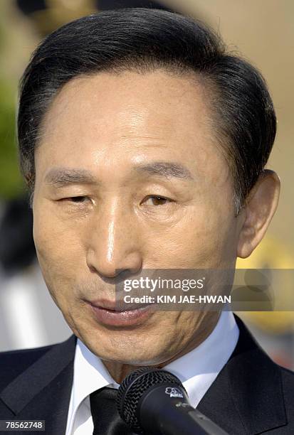 South Korea's opposition Grand National Party presidential candidate Lee Myung-Bak speaks during a visit to Dosan park in Seoul to mark the 75th...