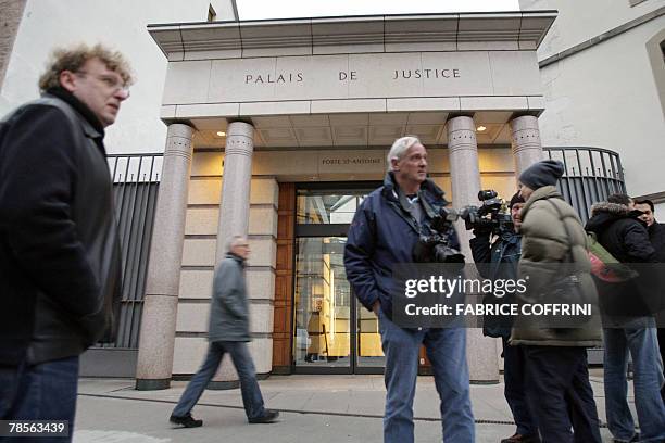 Newsmen are seen in front of Geneva's Law Courts 19 December 2007 during a public hearing of Cecile Brossard who confessed on 2005 the sex-related...