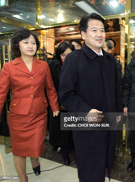 Chung Dong-Young , South Korea's United New Democratic Party presidential candidate, arrives with party member Choo Mee-Ae at party headquarters in...