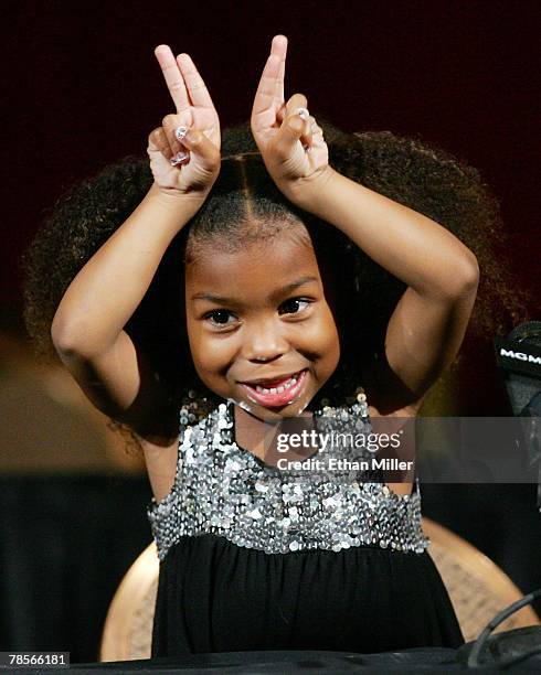 Floyd Mayweather Jr.'s daughter Jirah Mayweather jokes with photographers during a post fight news conference following her father's knockout victory...