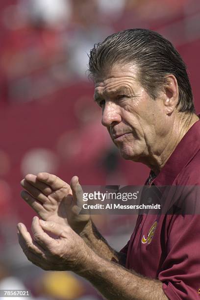 Assistant head coach Joe Bugel of the Washington Redskins applauds warm ups before play against the Tampa Bay Buccaneers at the Raymond James Stadium...