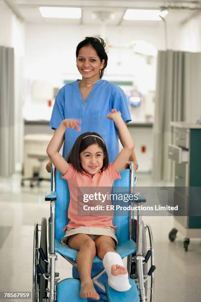 hispanic girl cheering in wheelchair - winners press stock pictures, royalty-free photos & images