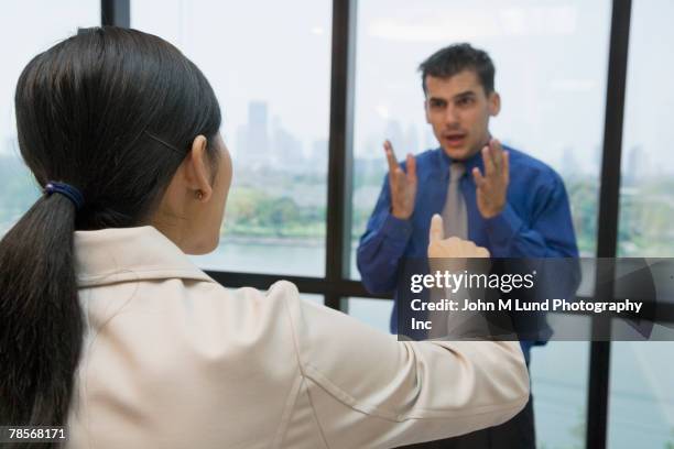 multi-ethnic businesspeople arguing - angry coworker stock pictures, royalty-free photos & images