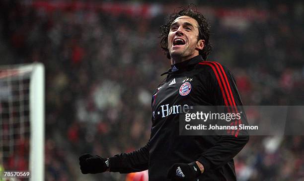 Luca Toni of Bayern celebrates after scoring 1-0 during the UEFA Cup Group F match between Bayern Munich and Aris Saloniki at the Allianz Arena on...