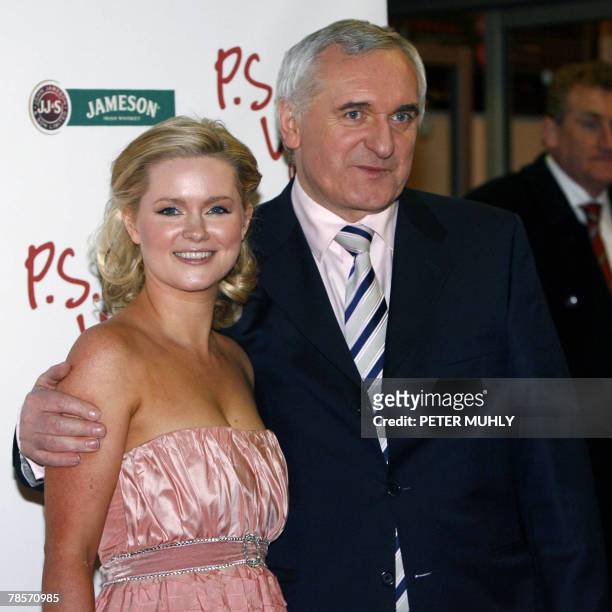 Irish Prime Minister Bertie Ahern stands with is daughter, author Cecelia Ahern 19 December 2007 at the Savoy Cinema in Dublin for the European...