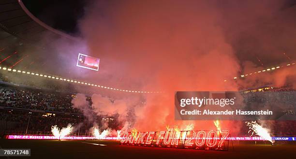 Firework in letters, read as "thanks for 2007" is seen after the UEFA Cup Group F match between Bayern Munich and Aris Saloniki at the Allianz Arena...