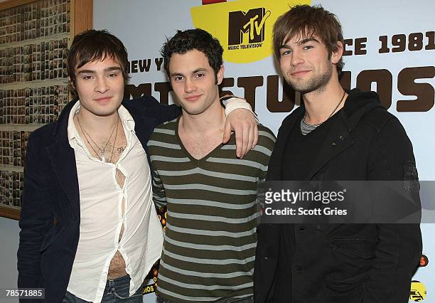 Actors Ed Westwick, Penn Badgley, and Chace Crawford pose for a photo backstage during MTV's Total Request Live at the MTV Times Square Studios...
