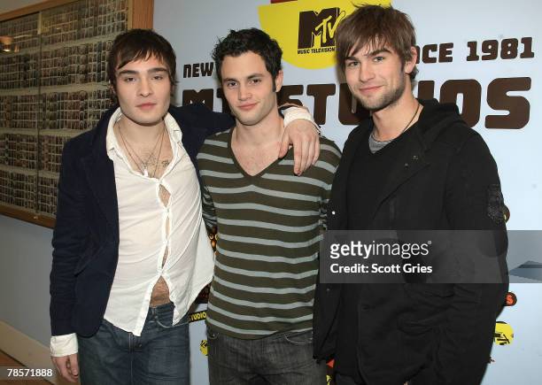Actors Ed Westwick, Penn Badgley, and Chace Crawford pose for a photo backstage during MTV's Total Request Live at the MTV Times Square Studios...