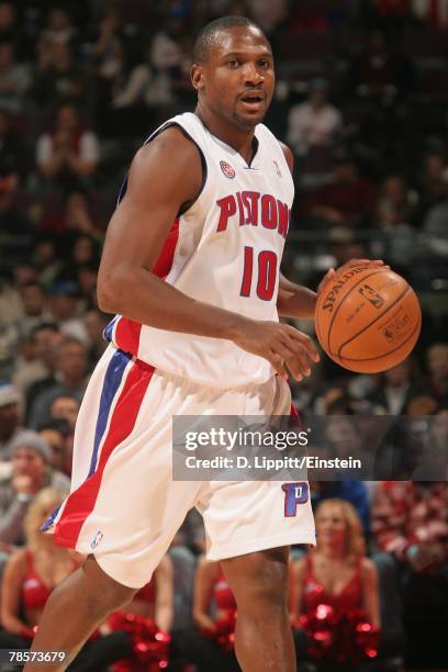 Lindsey Hunter of the Detroit Pistons moves the ball against the New Jersey Nets during the game on December 2, 2007 at the Palace of Auburn Hills in...