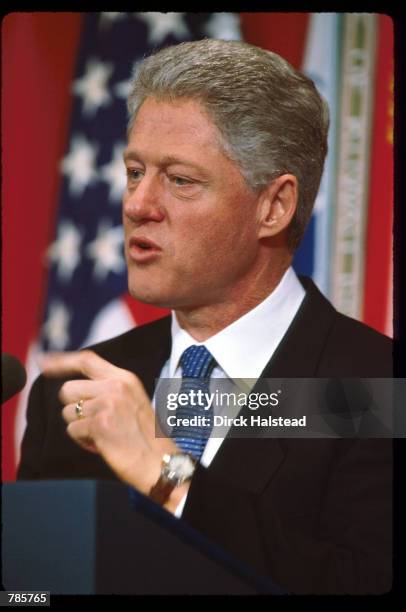 President Bill Clinton addresses the nation from the Pentagon February 17, 1998 in Washington, DC. Clinton demanded that Saddam Hussein give total...