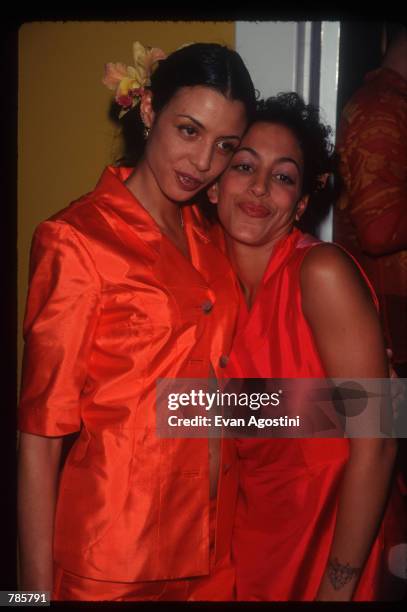 Daughter of Robert De Niro Drena De Niro stands with Gregory Hines'' daughter Daria Hines at the "Alpana Bawa" boutique in SoHo December 12, 1996 in...