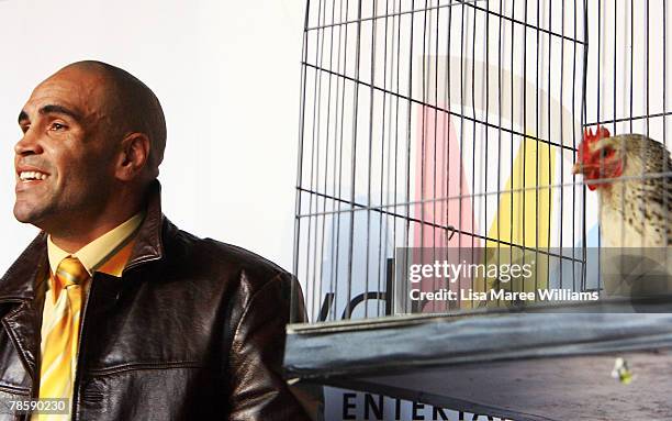 Anthony Mundine poses with a chicken on stage during a press conference at the Sydney Entertainment Centre on December 20, 2007 in Sydney, Australia....