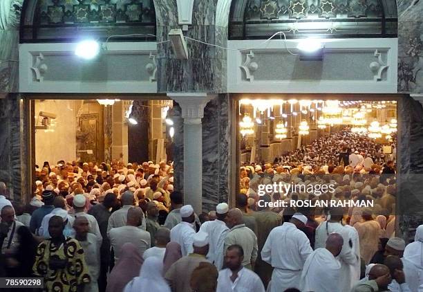 Muslim pilgrims perform the Sa'y seen from Marwah hill turning back heading to Safa hill after the circumambulation of the Kaba in the holy city of...